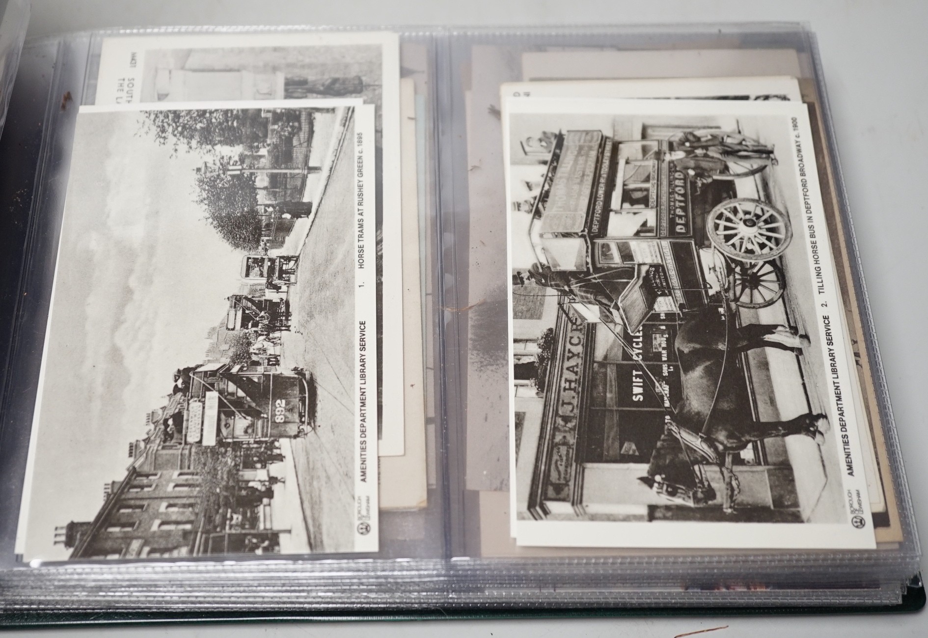 Postcards in three albums, to include themes, transport, theatre and topographical